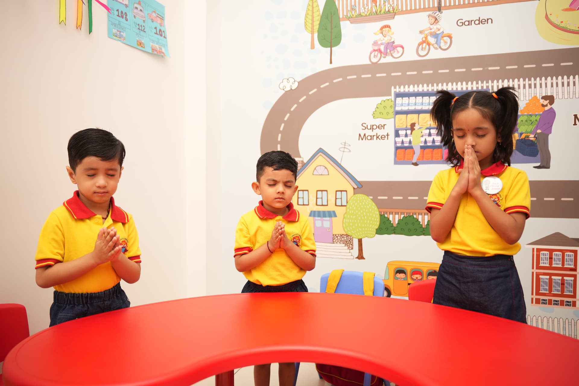 Children in Shanti Juniors uniform at morning prayer