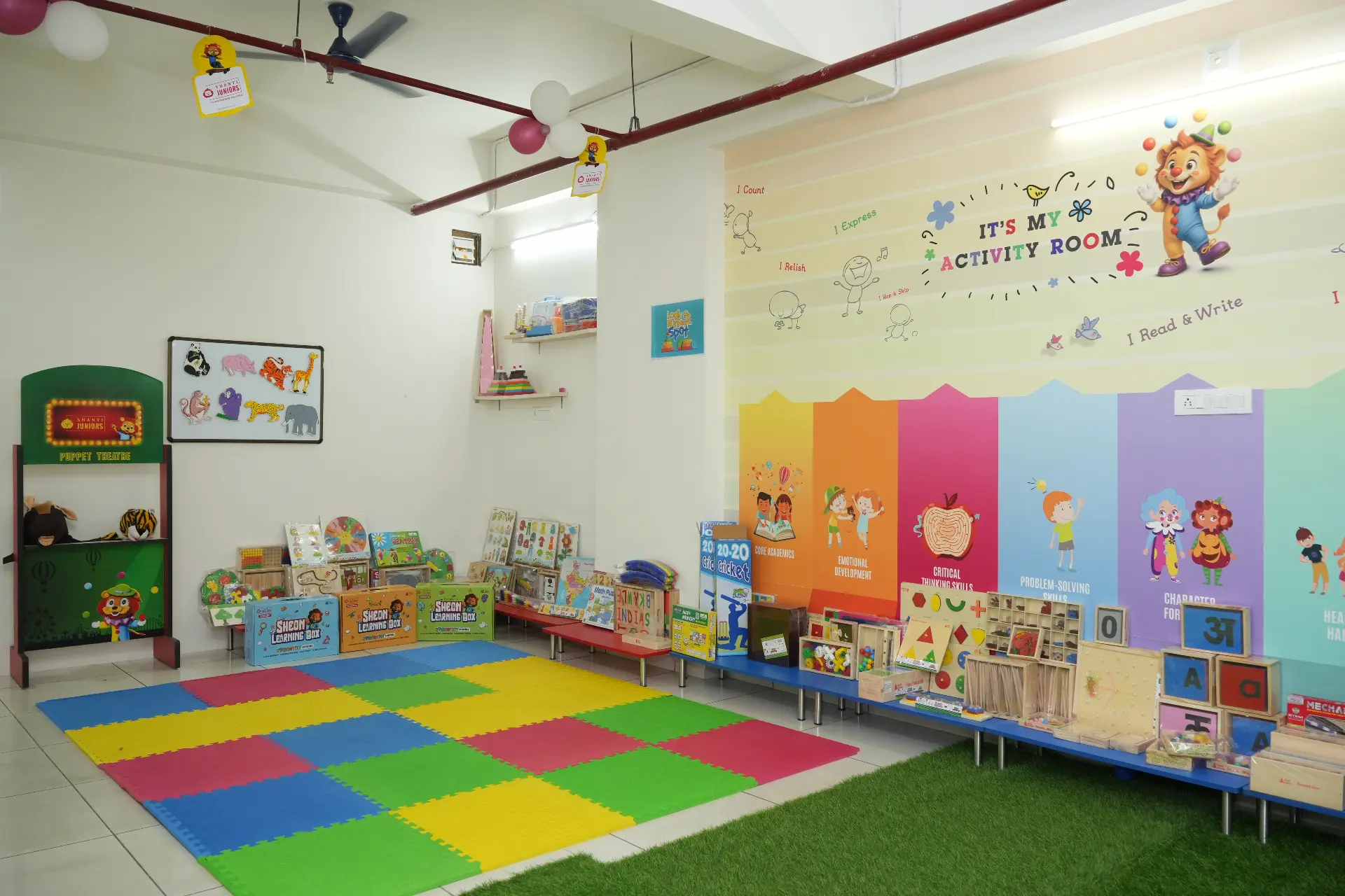 Colourful preschool activity room with learning kits